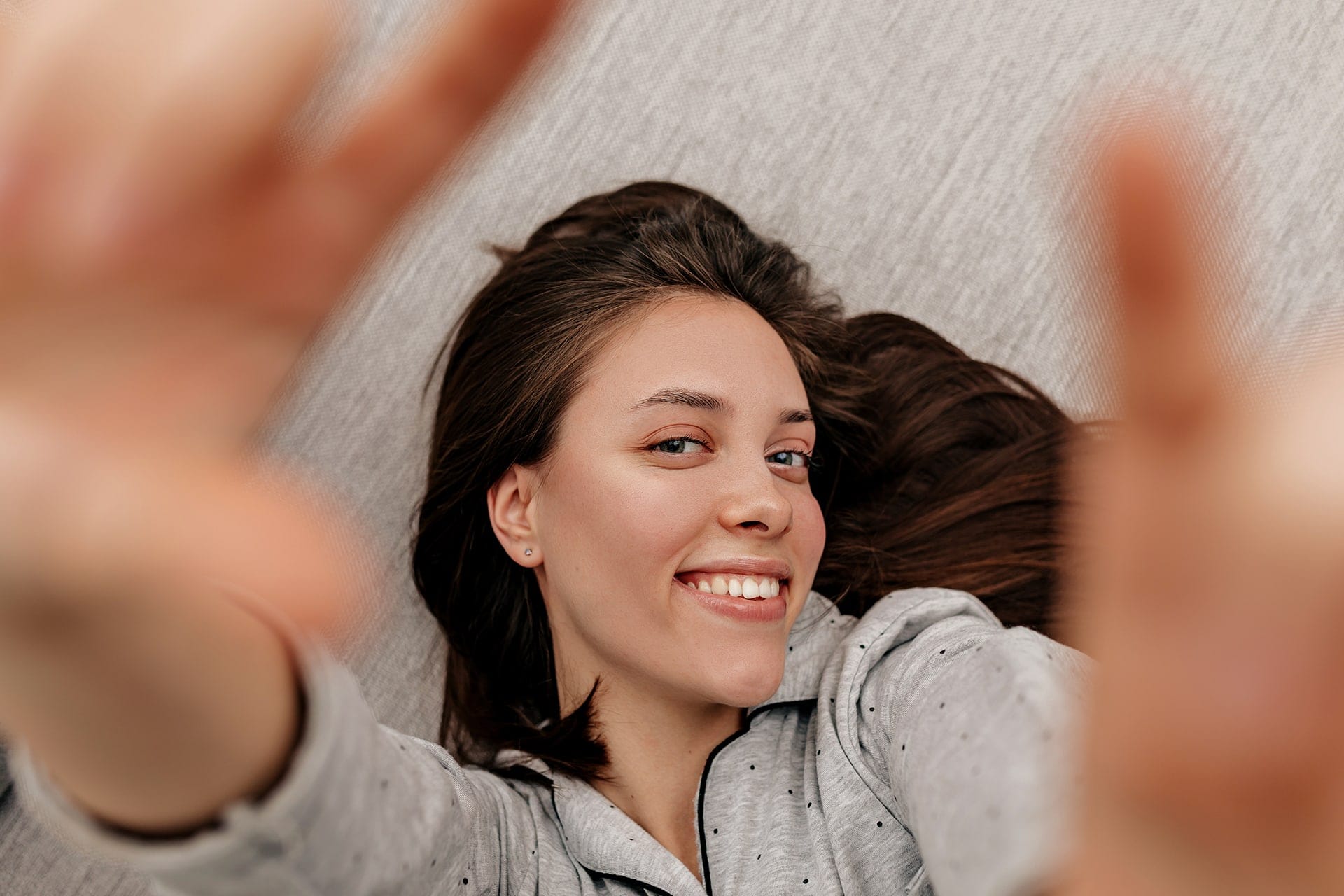 happy-lovable-girl-with-dark-hair-wearing-pajamas-2021-08-31-22-18-43-utc